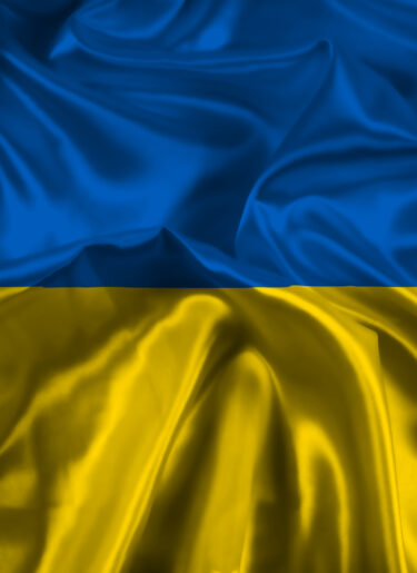 Abstract background of Ukraine flag with folds and creases