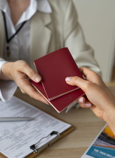 Woman receiving two passports
