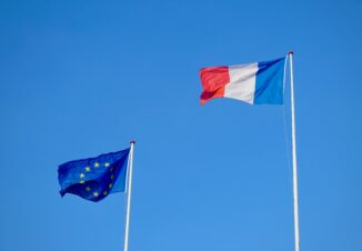 French and European Union flags waving