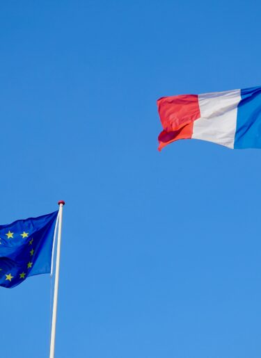 French and European Union flags waving