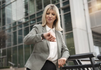 business woman checking her watch