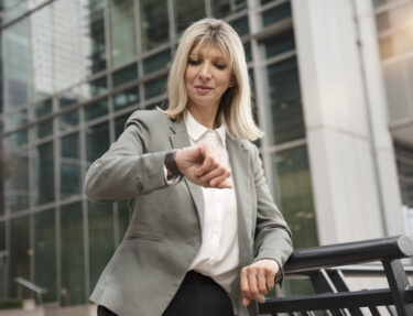business woman checking her watch