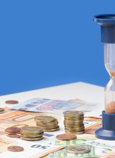 hourglass pile coins