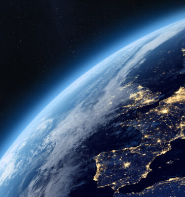 Earth planet in outer space. Europe from space. Night on planet with cities lights. Northern, Southern, Eastern, Western Europe at night viewed from space.