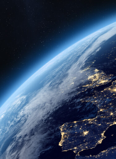Earth planet in outer space. Europe from space. Night on planet with cities lights. Northern, Southern, Eastern, Western Europe at night viewed from space.