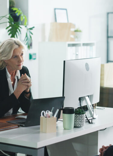 Meeting, performance review and business people in office with advice, evaluation or development.